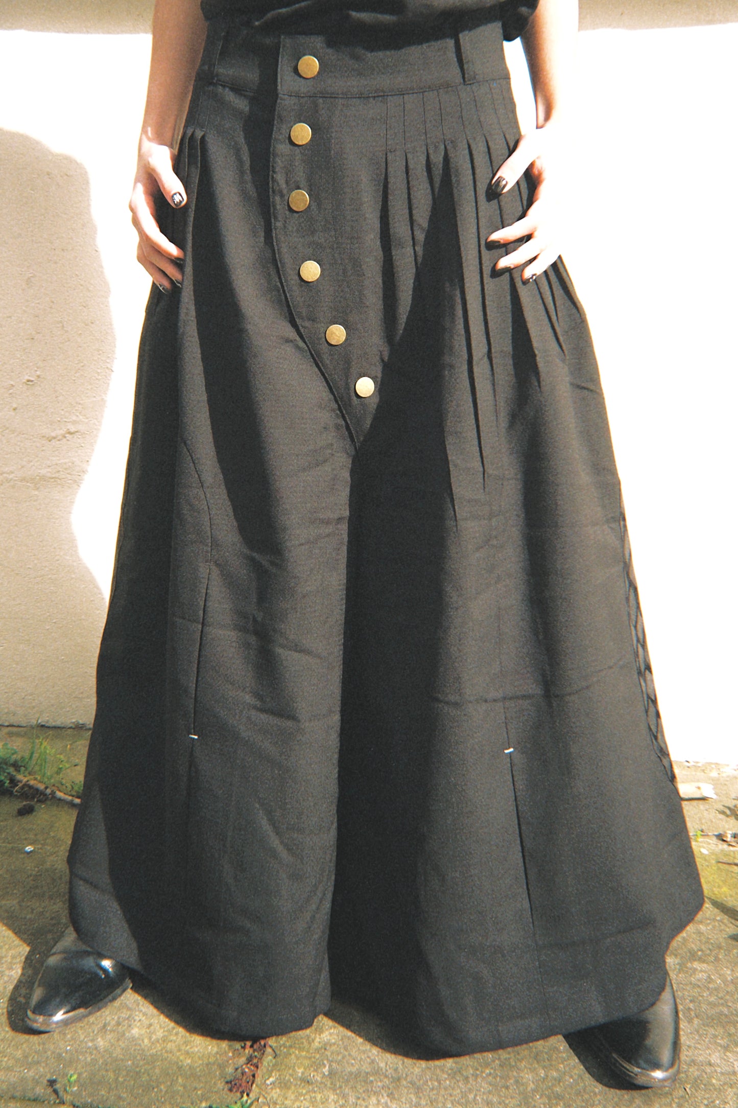 SCIMITAR-PLEATED WIDE WOOL TROUSERS