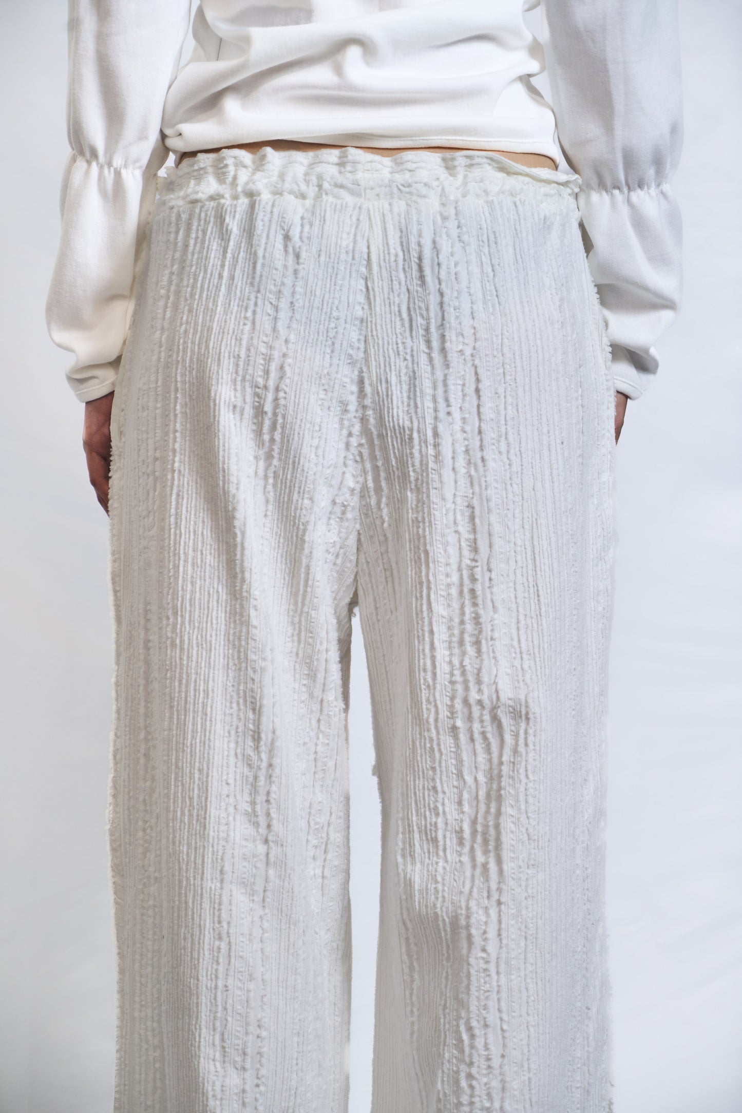 CRINKLED TROUSERS