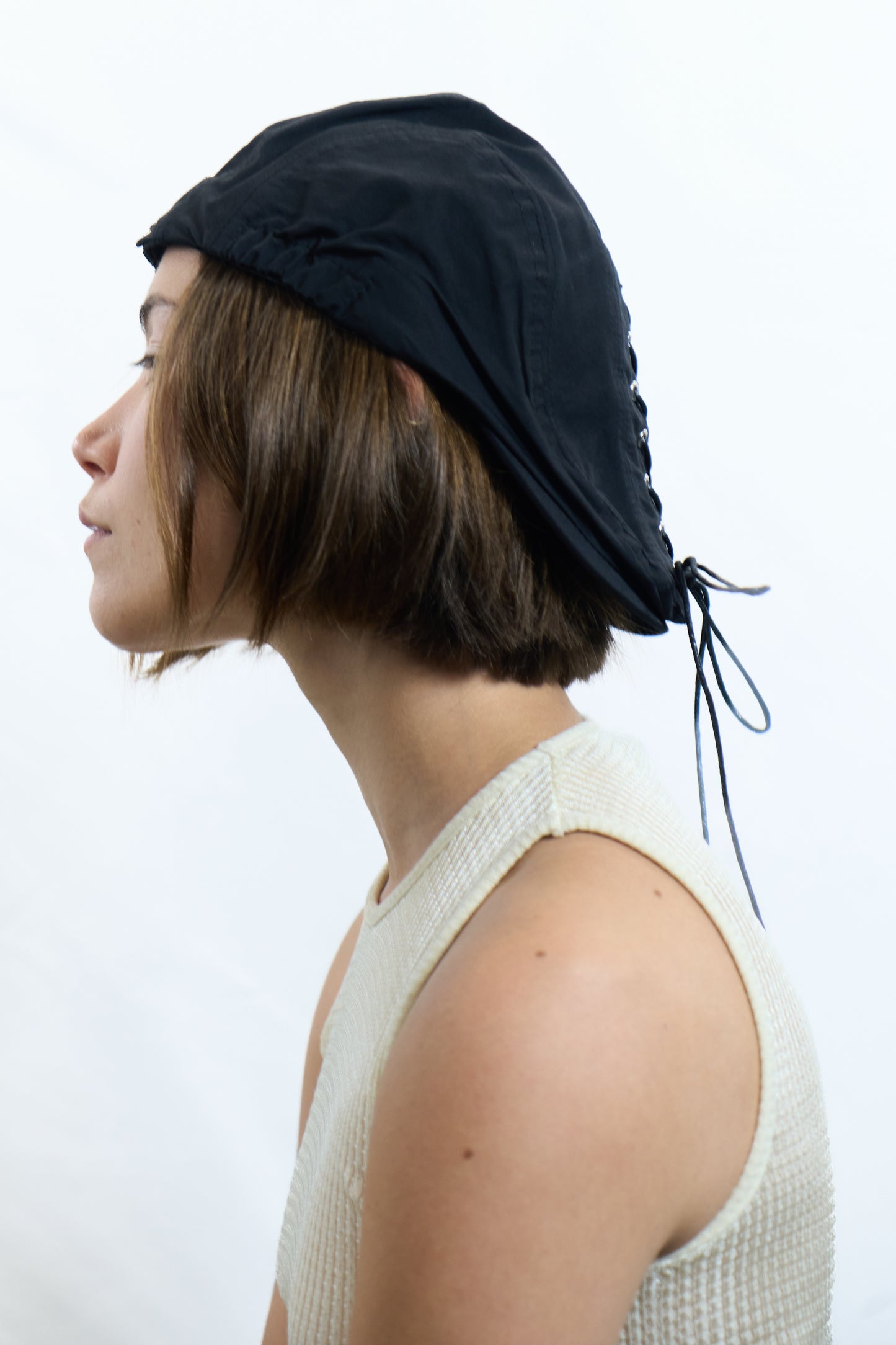CORSET STRING CAP
