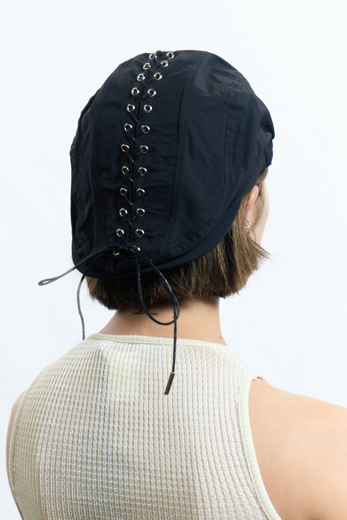 CORSET STRING CAP