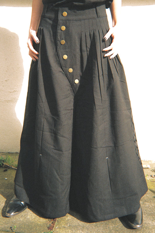 SCIMITAR-PLEATED WIDE WOOL TROUSERS