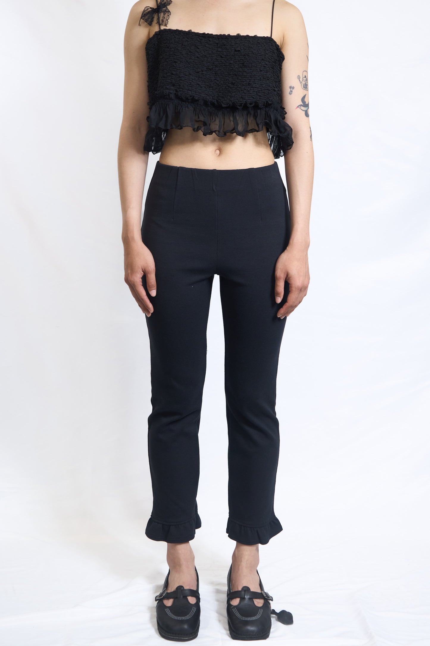RUFFLE-HEM SLIM PANTS