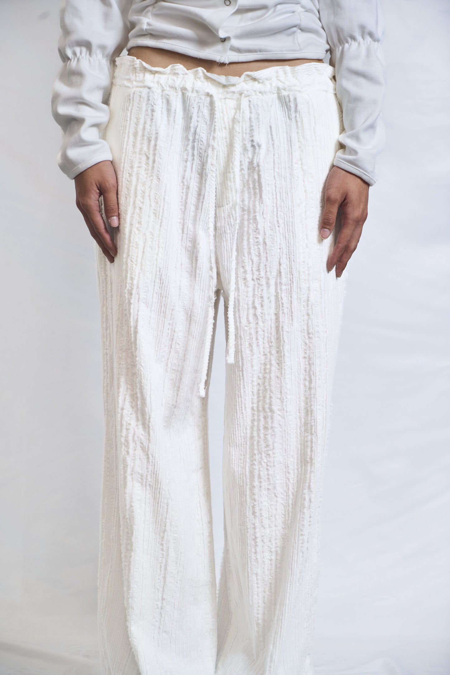 CRINKLED TROUSERS