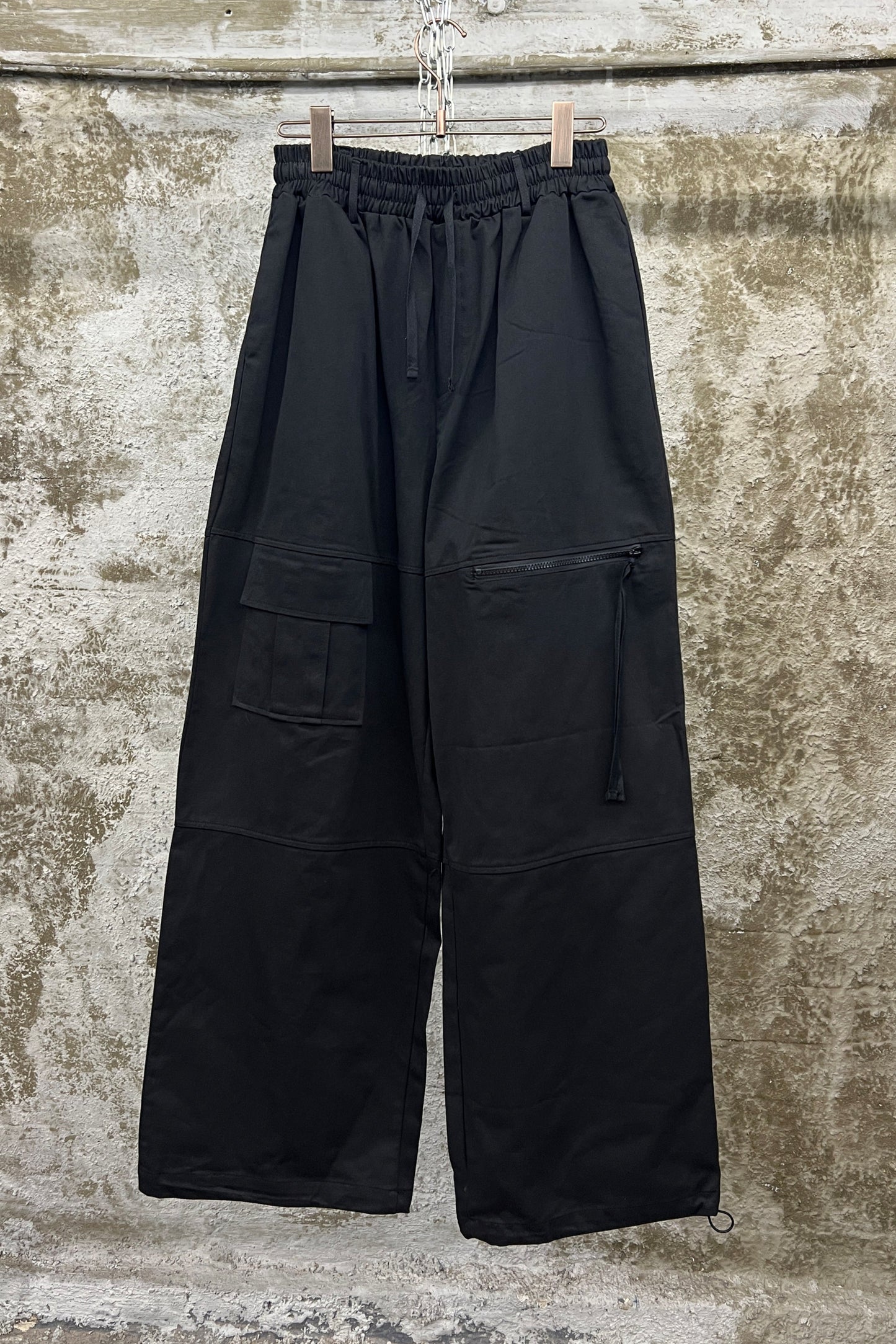 ASYMMETRIC POCKET WIDE-LEG TROUSERS