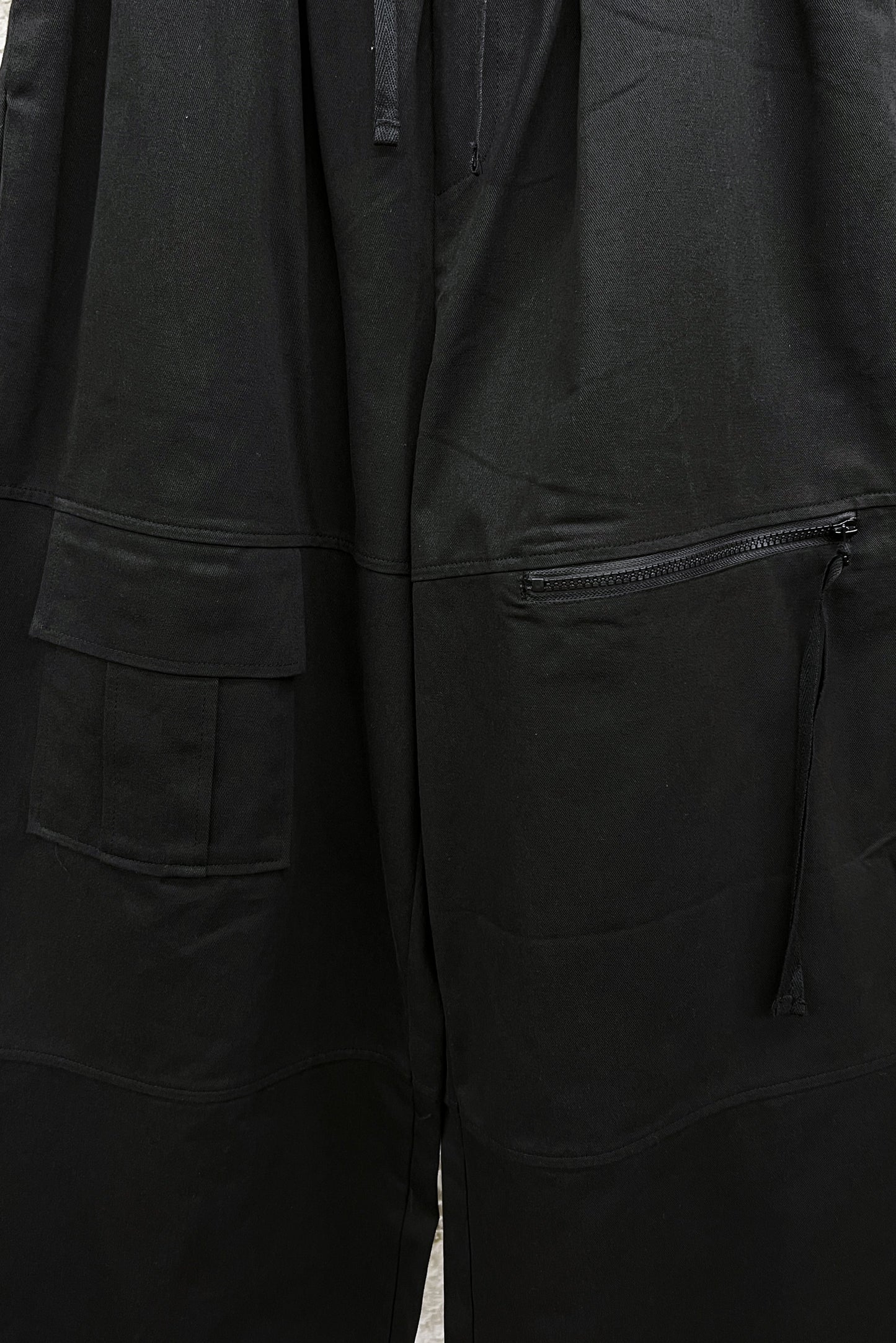 ASYMMETRIC POCKET WIDE-LEG TROUSERS