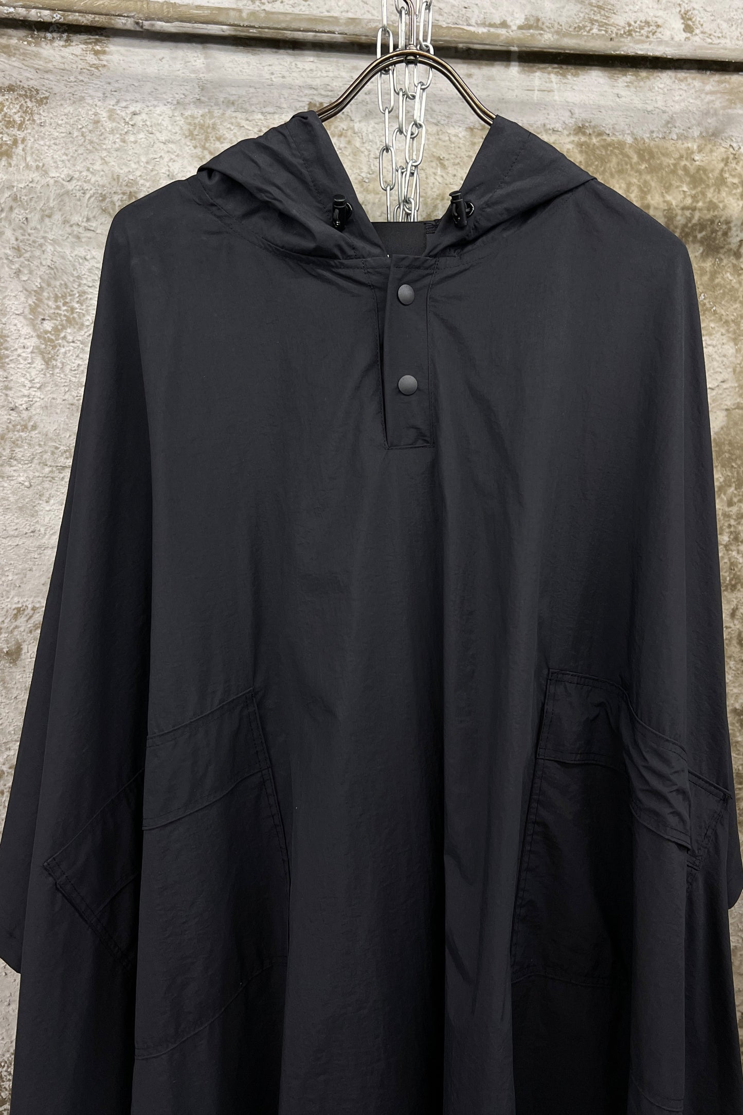BLACK TECHNICAL NYLON HOODED CAPE
