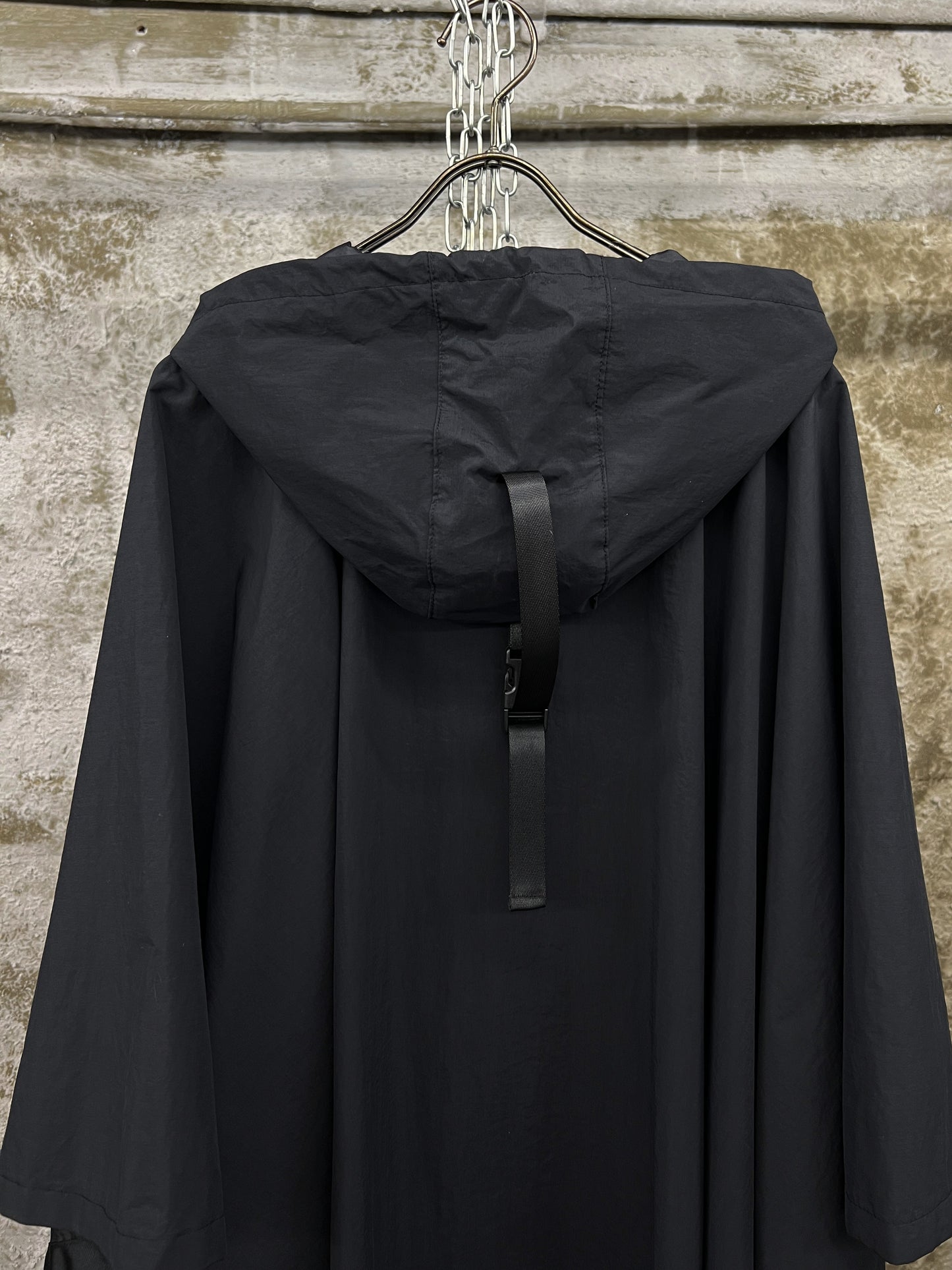 BLACK TECHNICAL NYLON HOODED CAPE