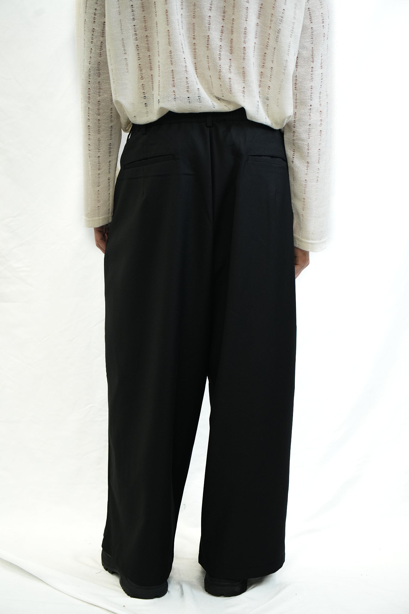 BLACK PLEATED TROUSERS